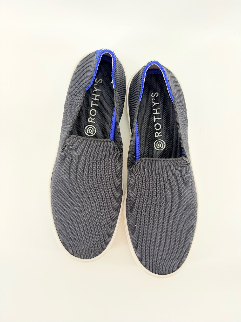 Rothy's Black Knit Original Slip-On Sneakers with Blue & White Heel Tabs - Picture 3 of 7